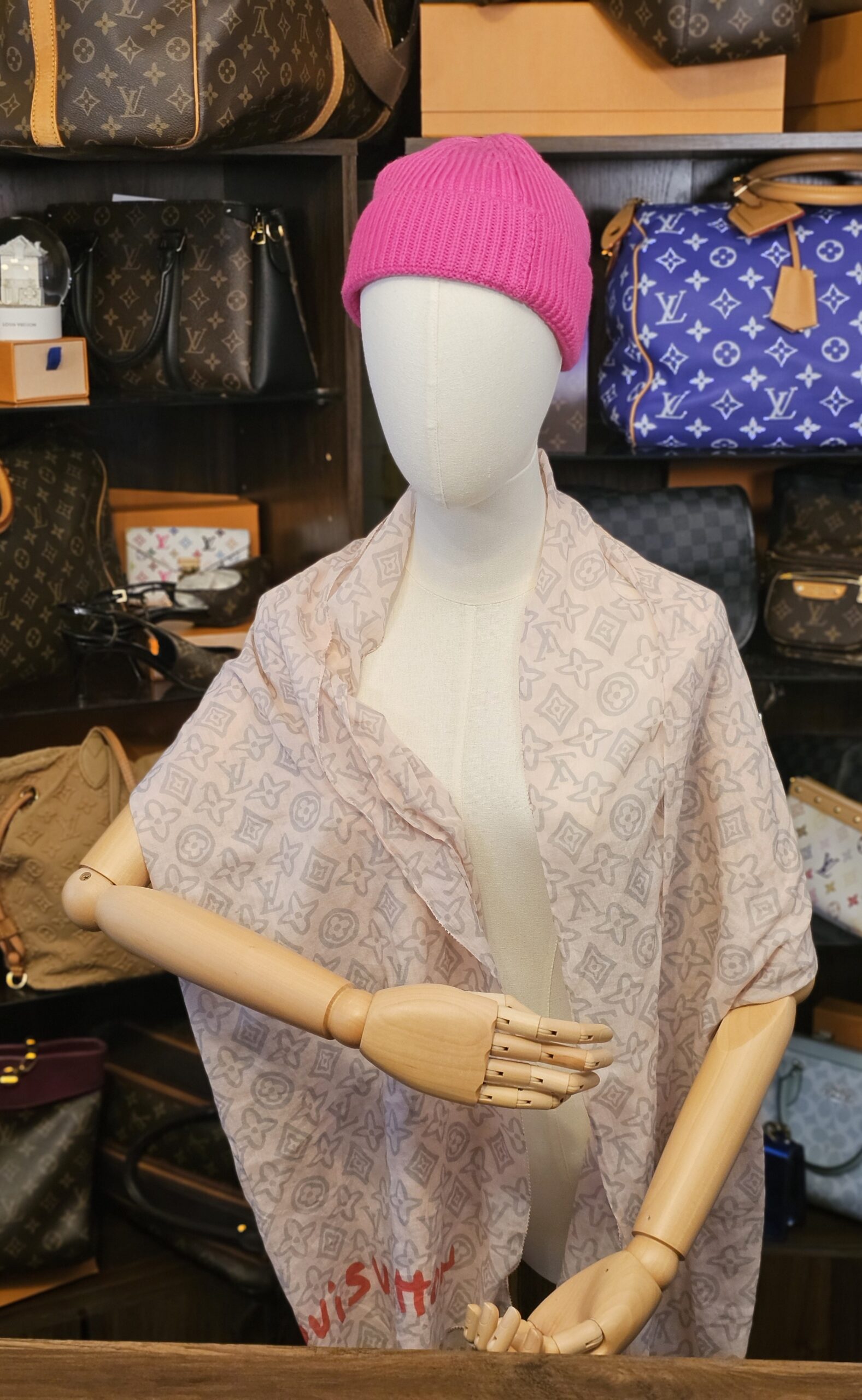 Worn open across the shoulders on a mannequin