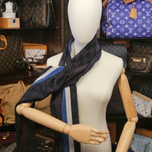 Wrapped once around the neck on a mannequin