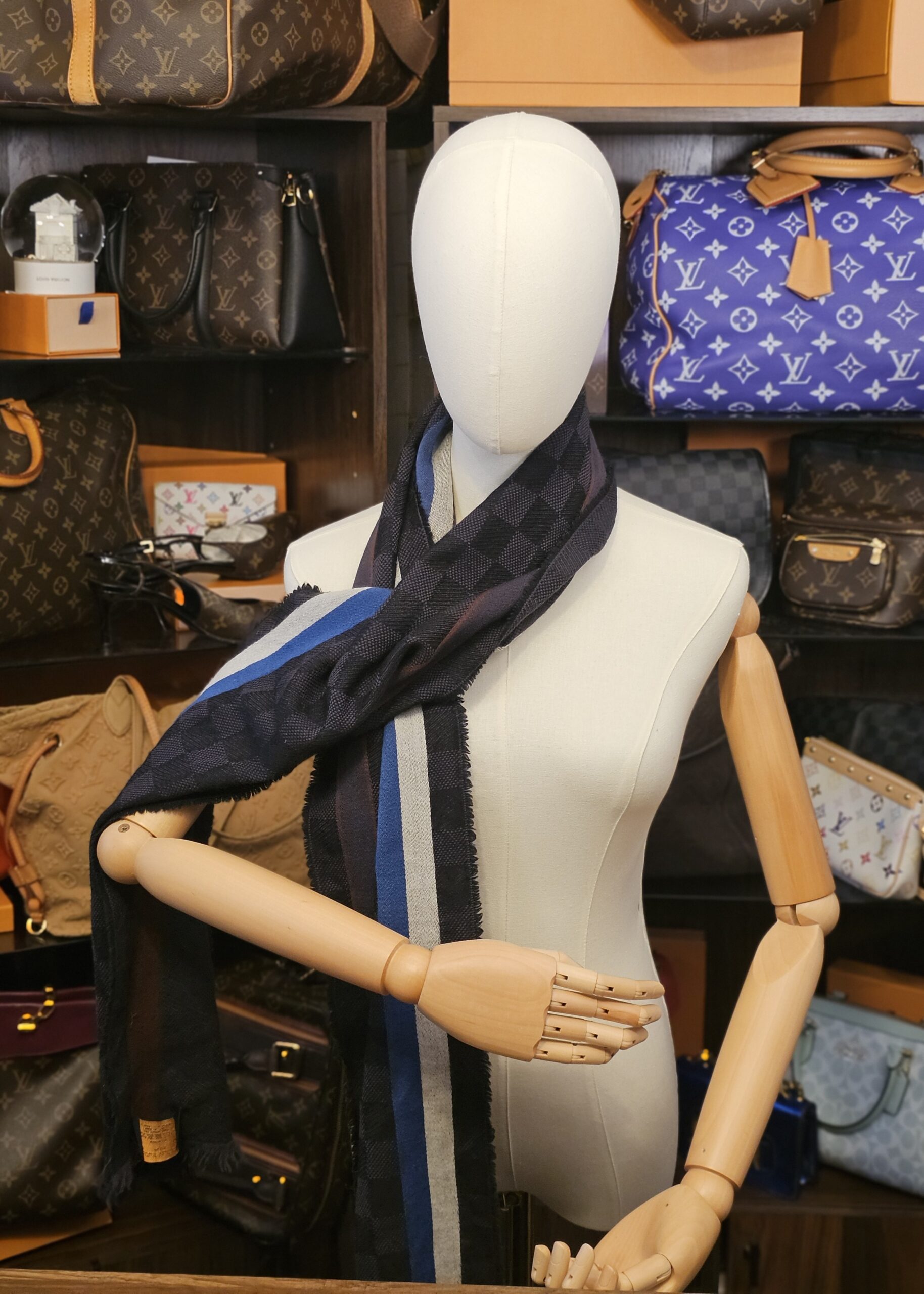 Wrapped once around the neck on a mannequin