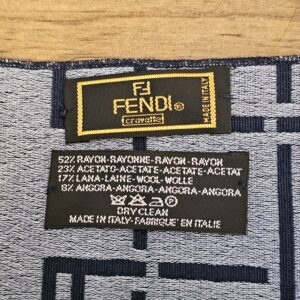 Brand label and fabric content tag, made in Italy