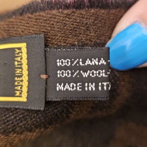 Content tag reading 100% wool, made in Italy