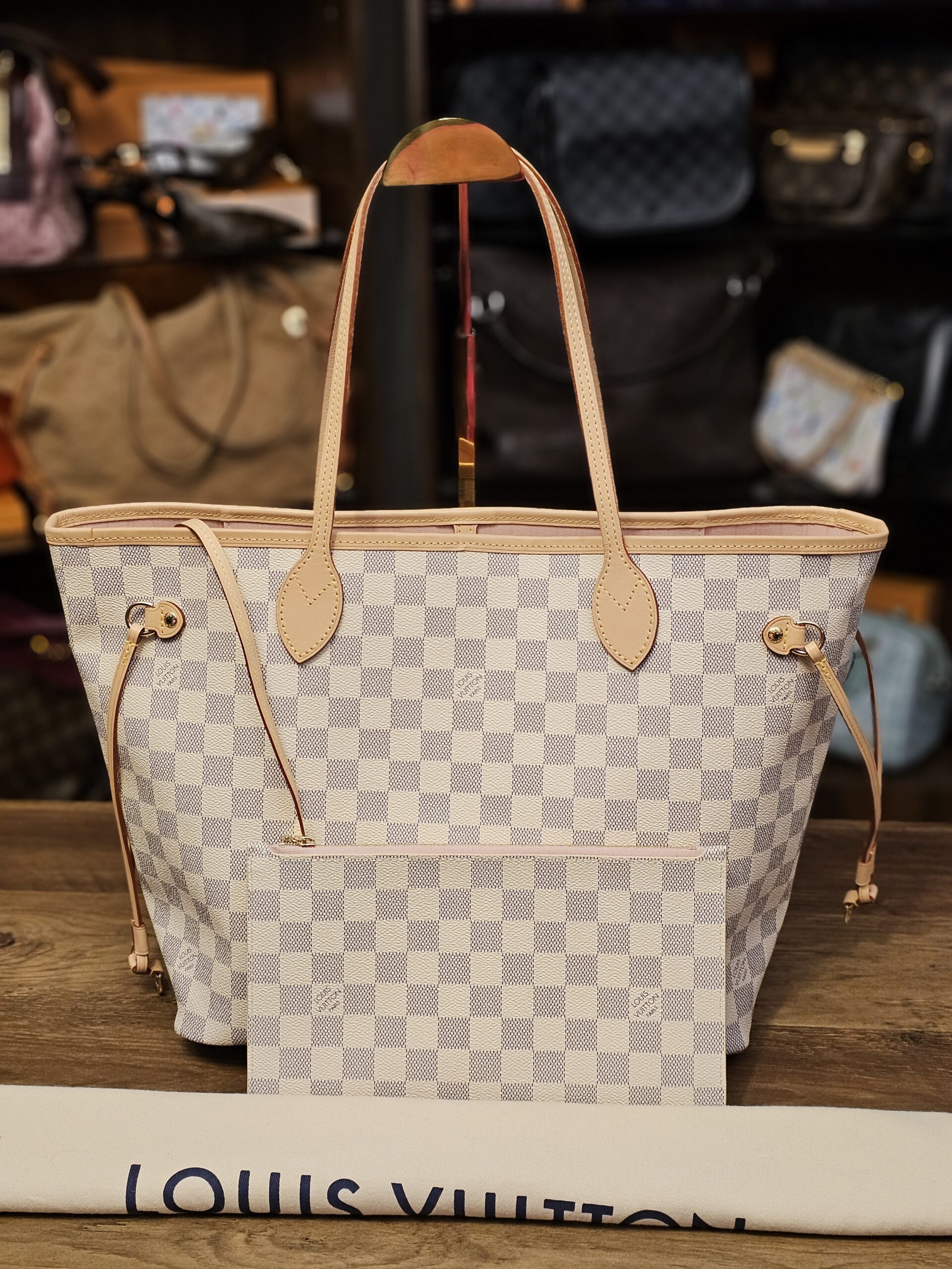 Louis Vuitton Damier Azur Neverfull MM and Pouch, front view on its dust bag
