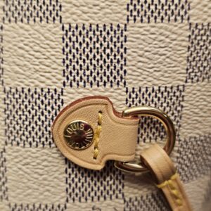 Side drawstring and gold-tone grommet