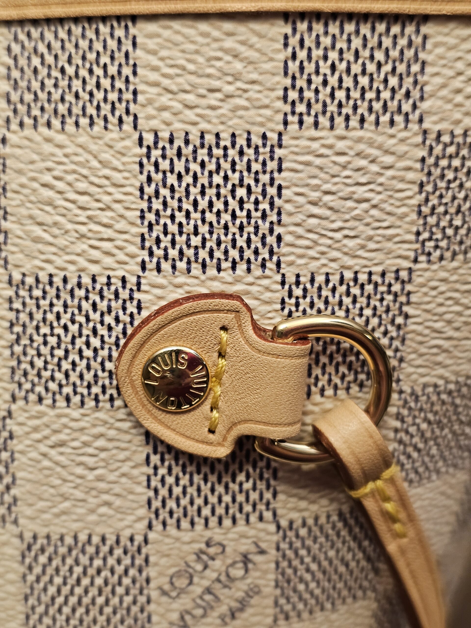 Side drawstring and gold-tone grommet