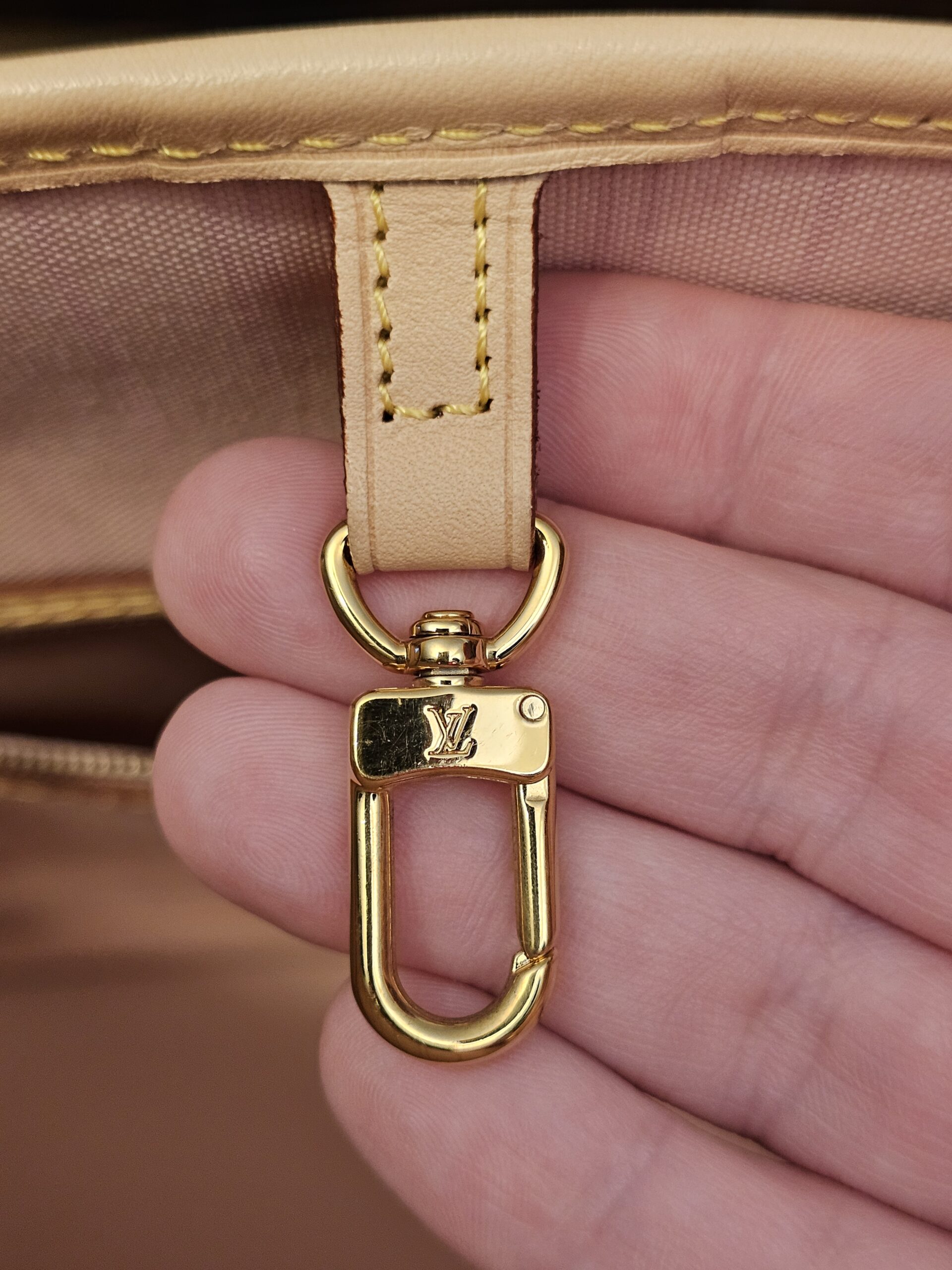 Interior gold-tone clip