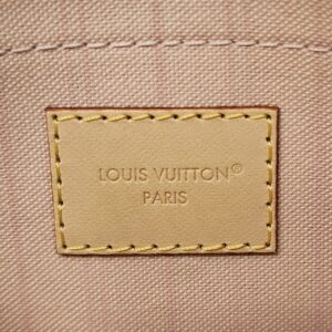 Interior heat stamp on the pink lining