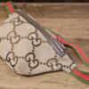Gucci Jumbo GG Canvas Web Belt Bag, three-quarter view with the Web strap