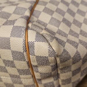 Close up of a bottom corner with light wear