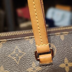 Close up of a handle base and stitching
