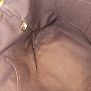 Interior with slip pocket and D ring
