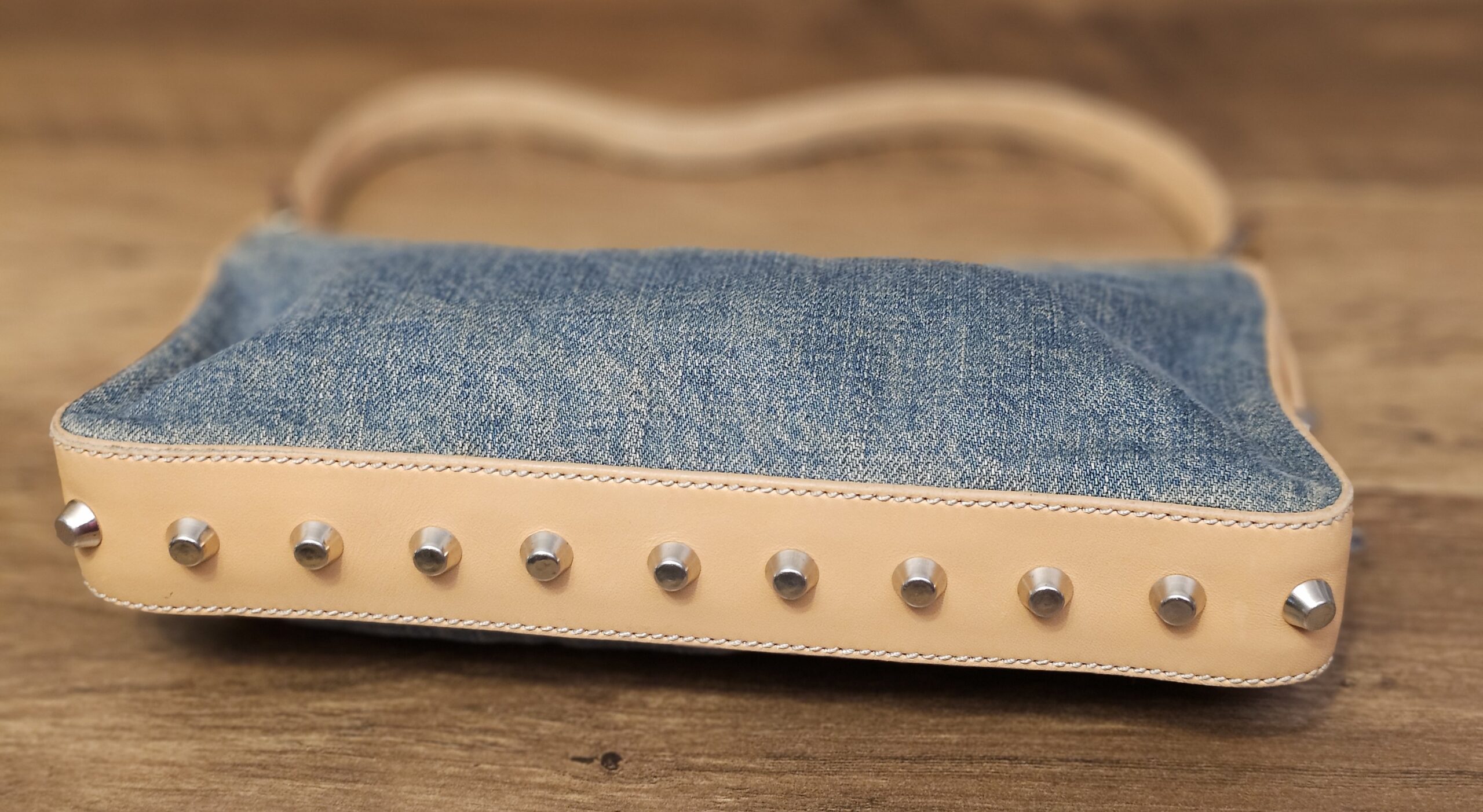 Base view showing the row of silver-tone studs