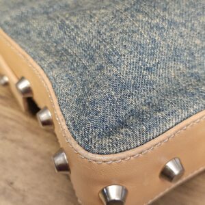 Close up of the lower corner and studded trim
