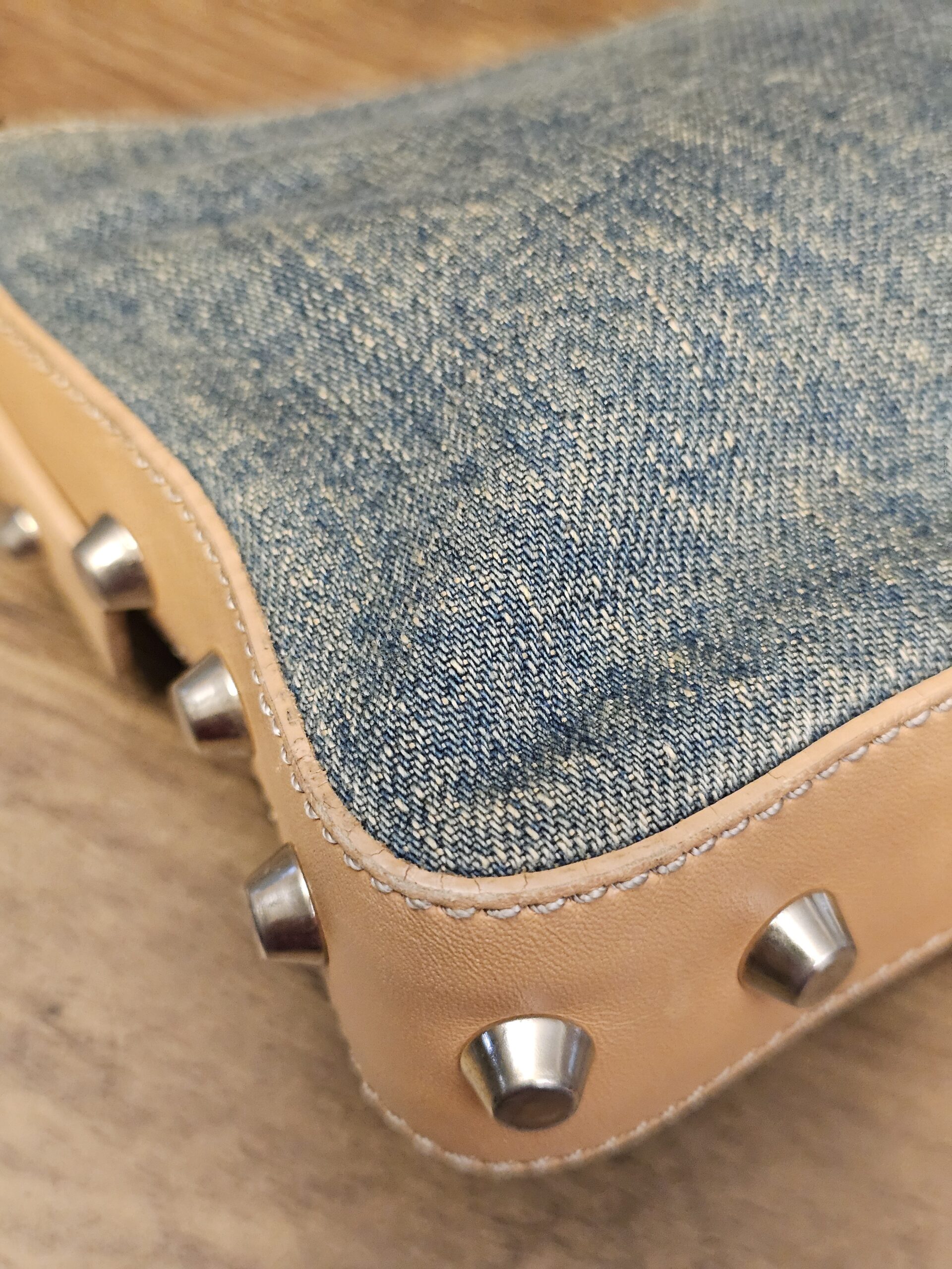 Close up of the lower corner and studded trim