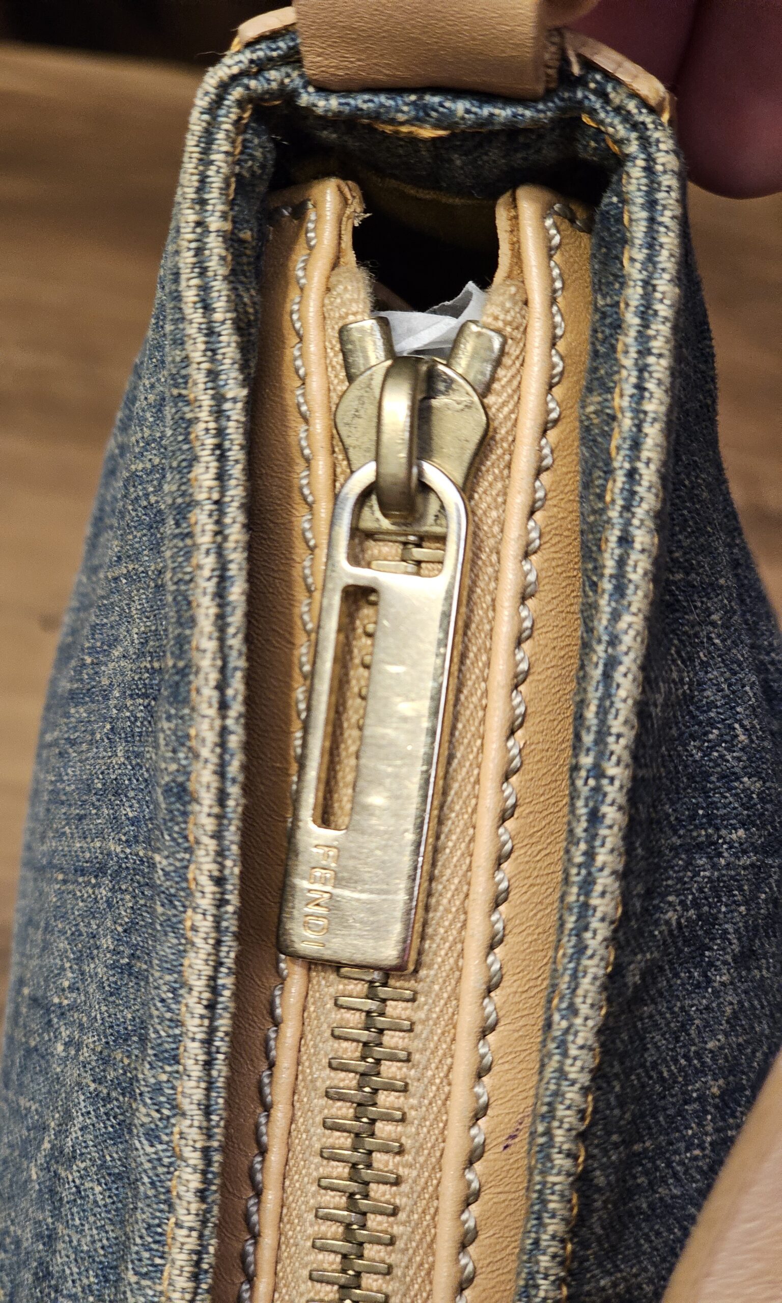 Top zipper with the logo zip pull