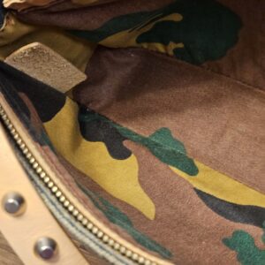 Interior with camouflage lining along the zip