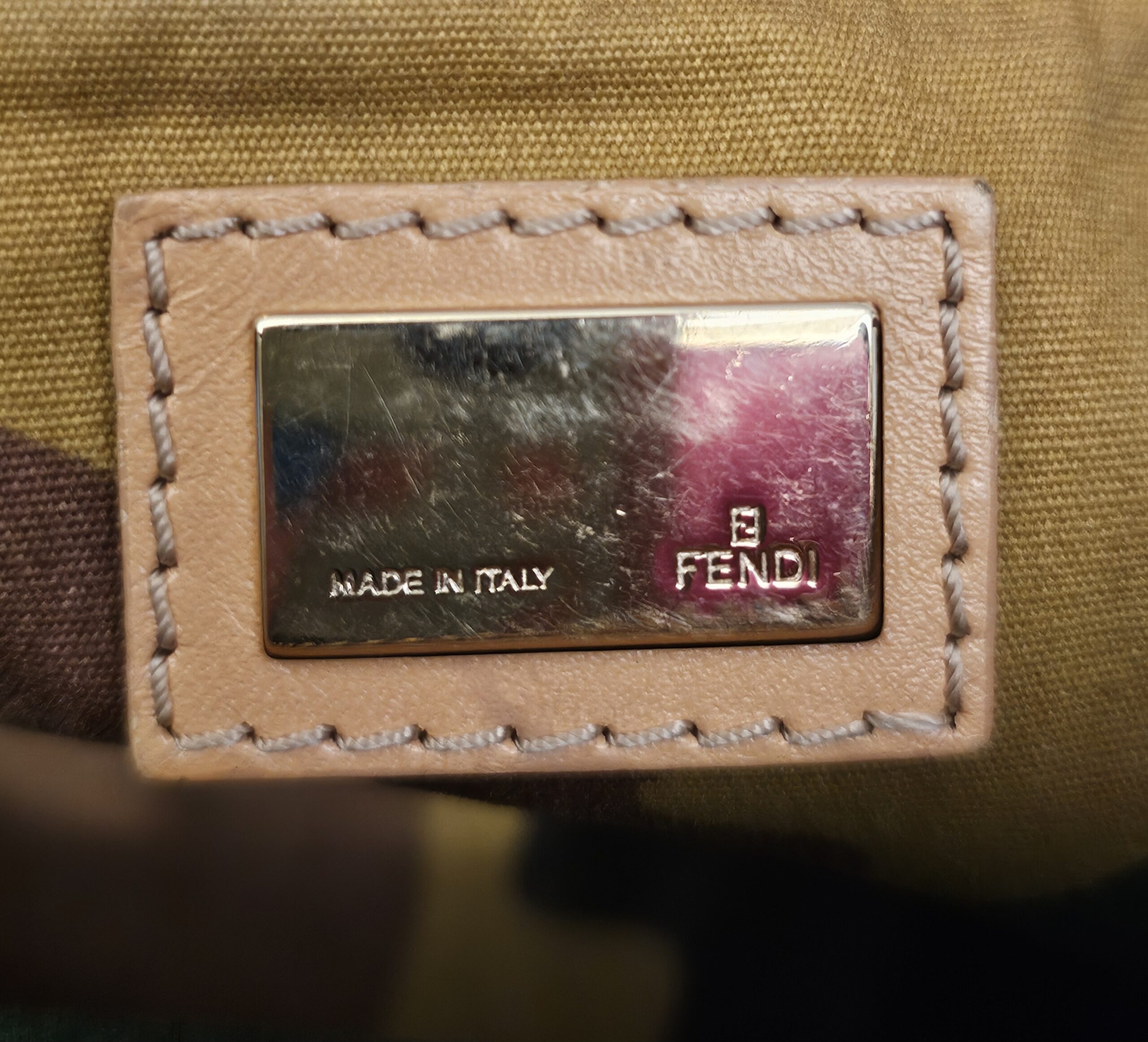 Interior logo plate reading Made in Italy