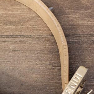 Shoulder strap with the engraved zip pull